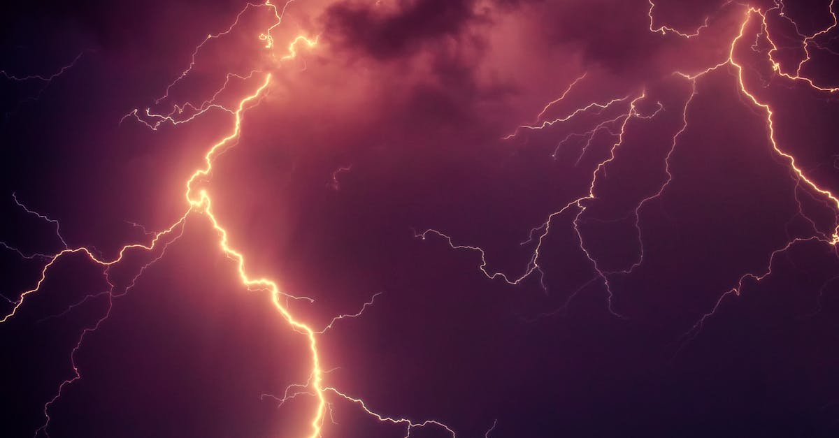 Stunning capture of bright lightning illuminating a dark stormy sky at night.